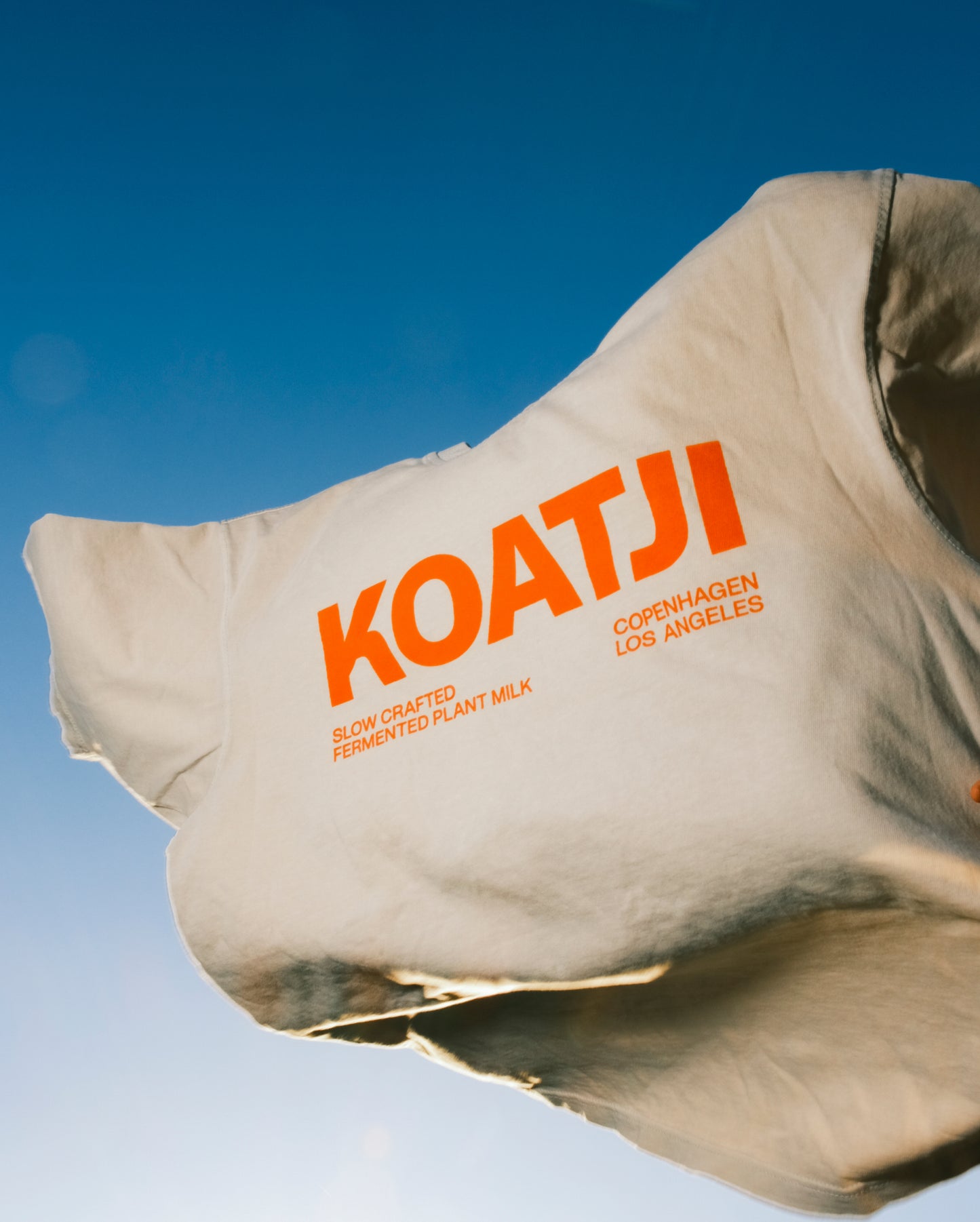 KOATJI T-Shirt - Lt Gray / Orange